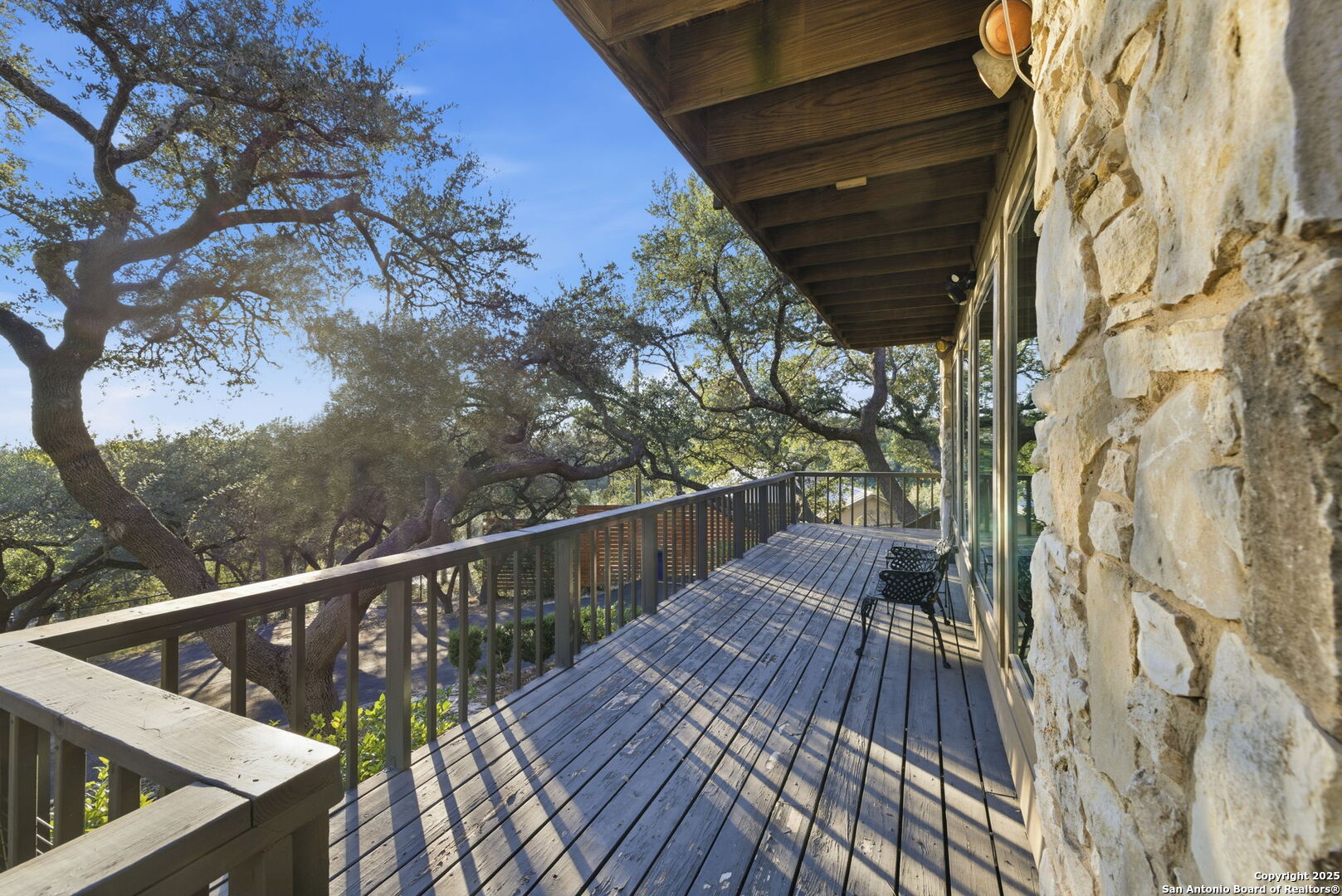 1072 Summit Canyon Lake, TX 78133 - Photo 12 of 50 a view of balcony with wooden floor and fence