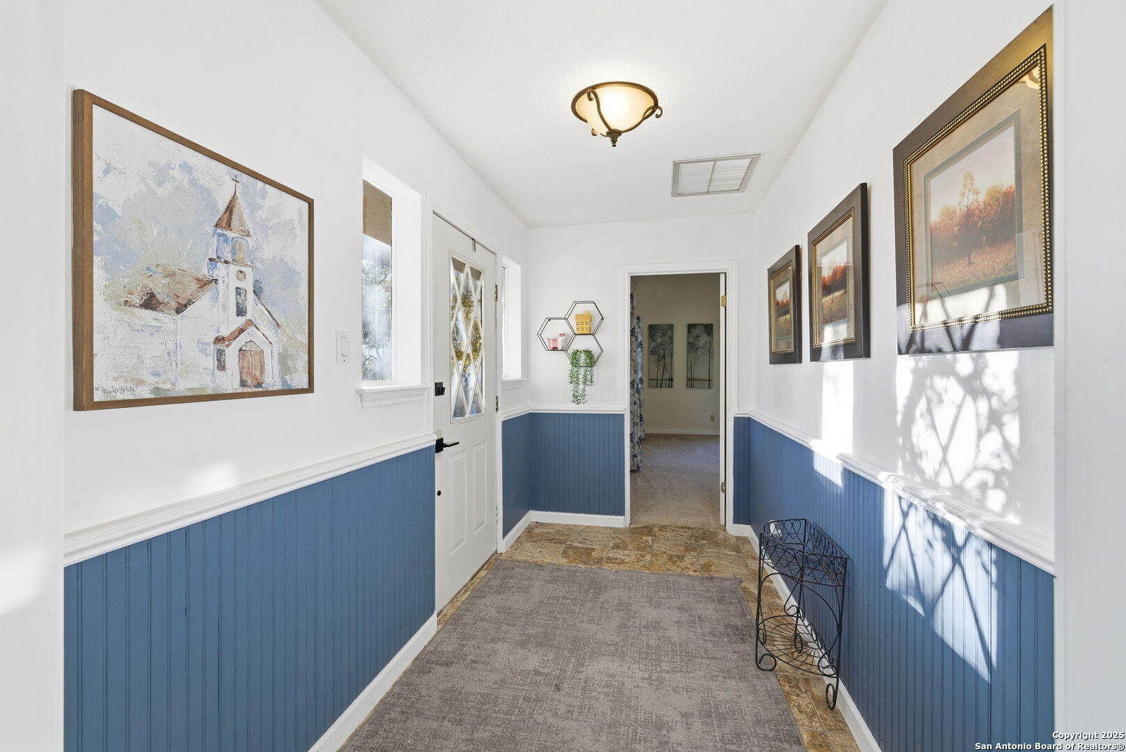 1072 Summit Canyon Lake, TX 78133 - Photo 19 of 50 a view of a hallway with wooden floor and furniture