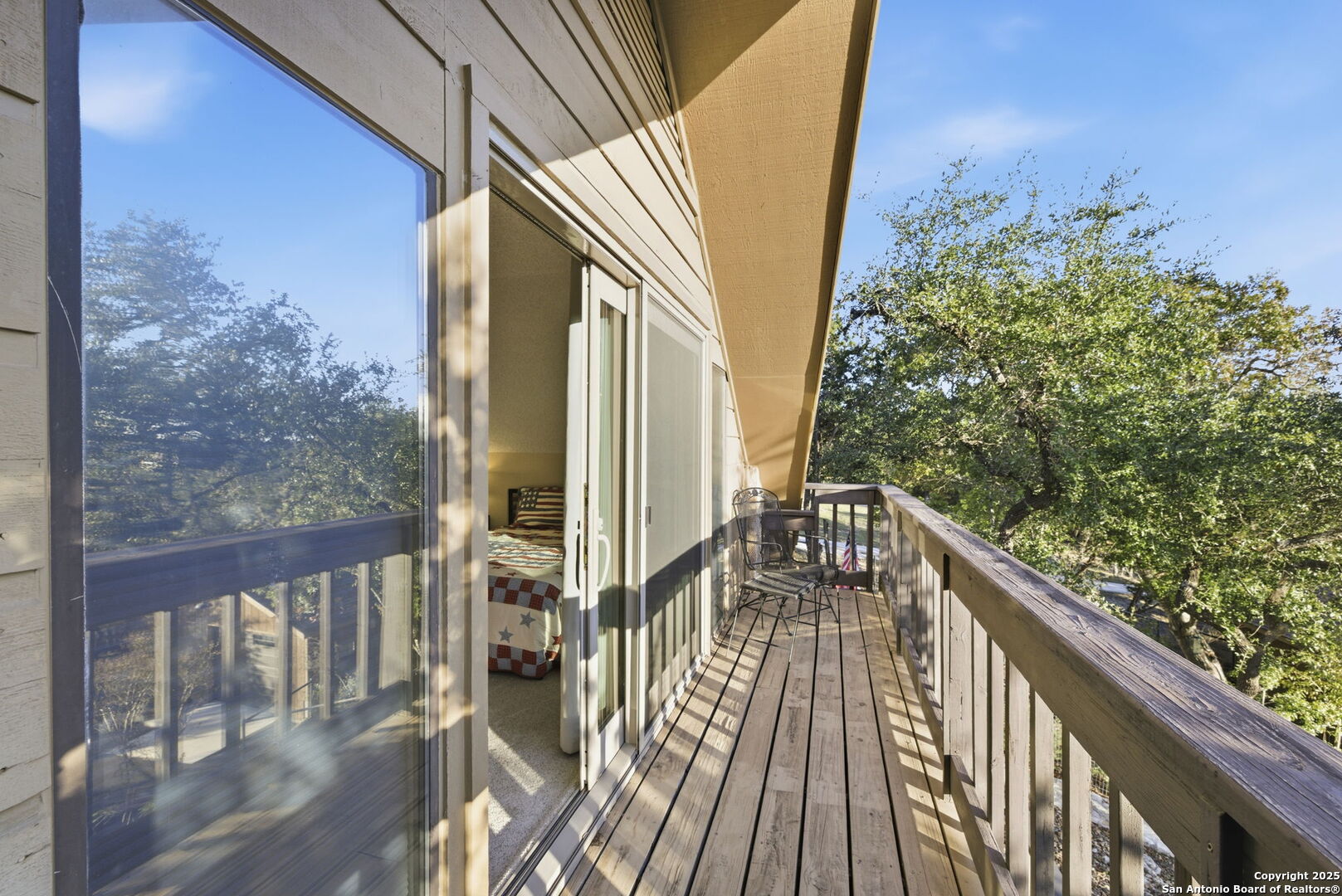 1072 Summit Canyon Lake, TX 78133 - Photo 44 of 50 a view of balcony with wooden floor and fence