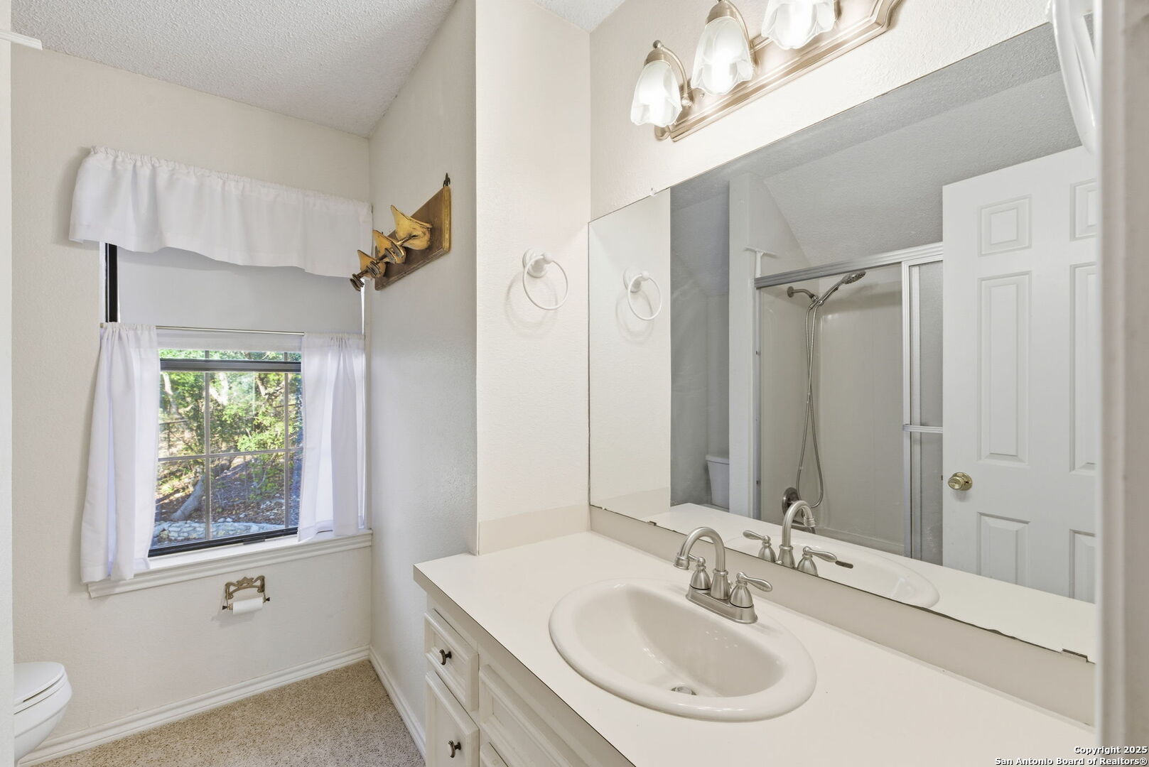 1072 Summit Canyon Lake, TX 78133 - Photo 46 of 50 a bathroom with a sink double vanity and a mirror