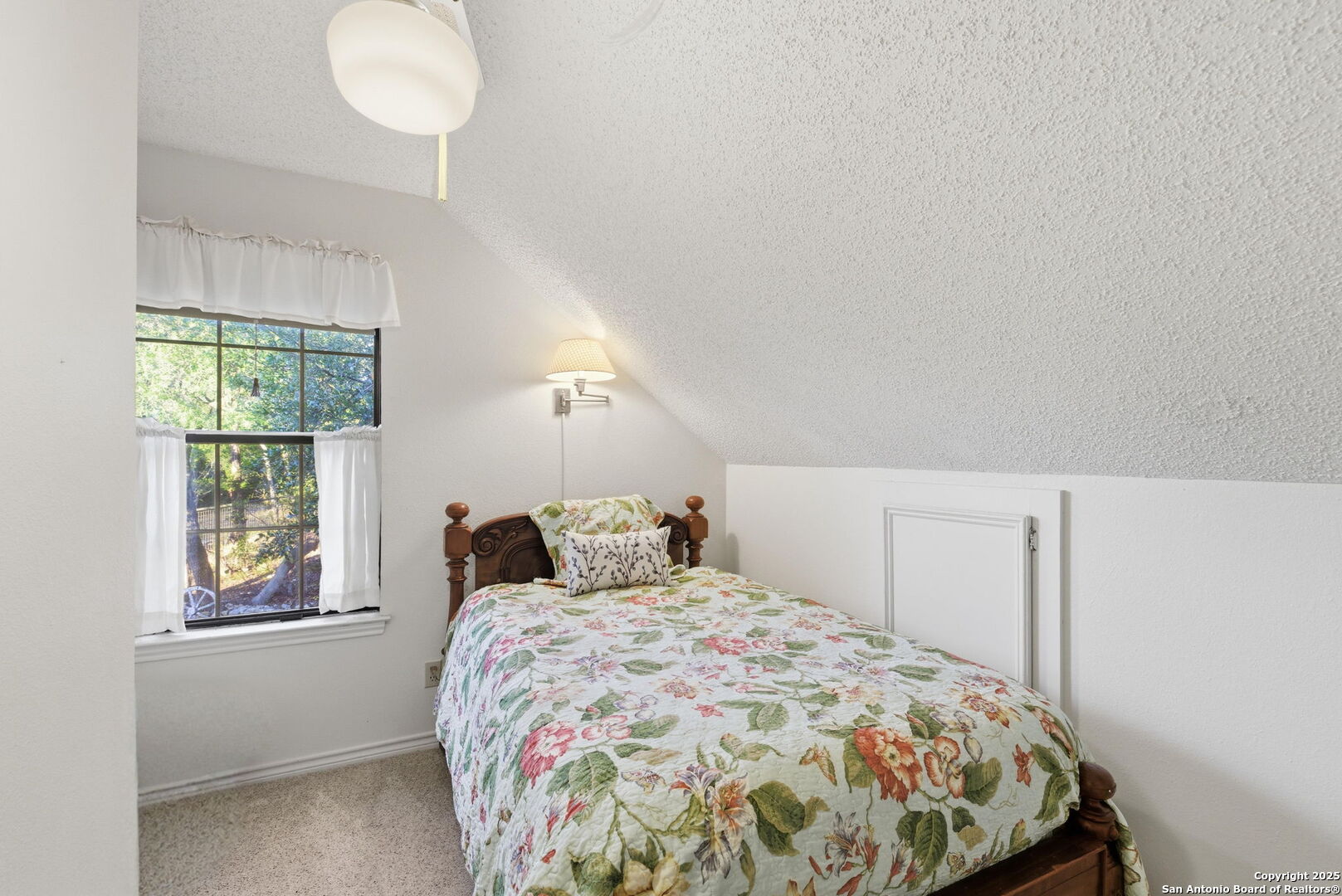 1072 Summit Canyon Lake, TX 78133 - Photo 49 of 50 a bedroom with a bed and a window