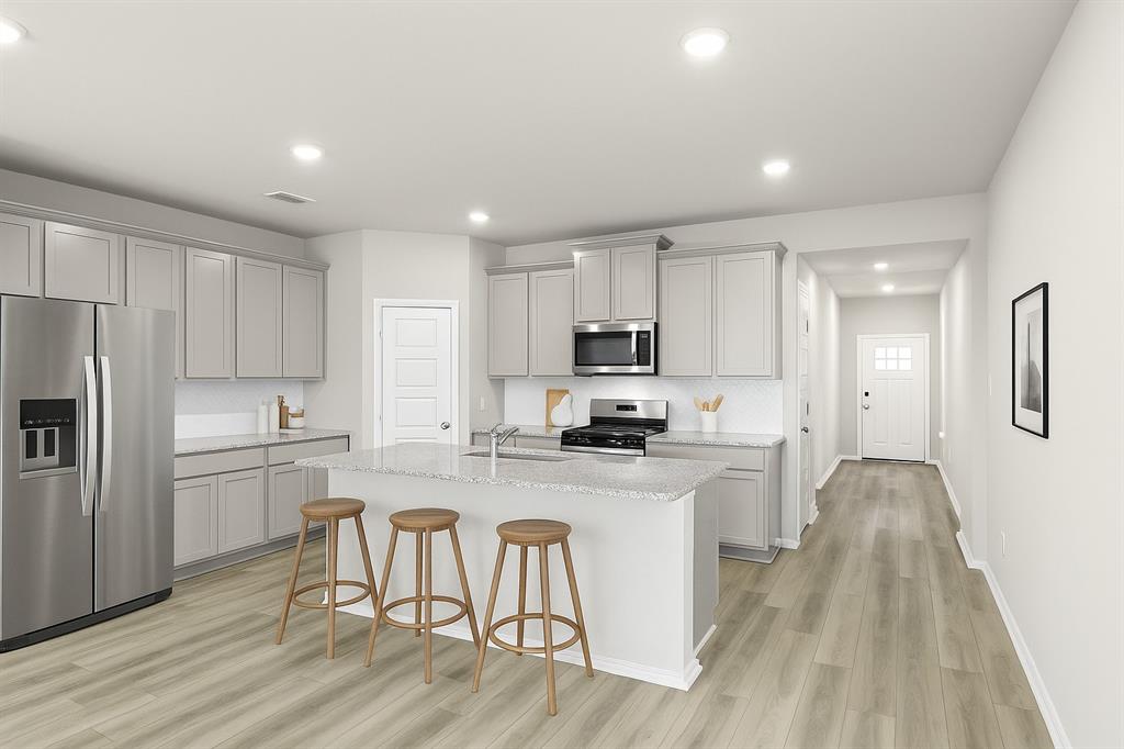 8716 Lone Star Lane Pilot Point, TX 76258 - Photo 3 of 25 McClellan II_Kitchen