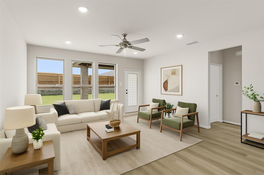 8716 Lone Star Lane Pilot Point, TX 76258 - Photo 4 of 25 McClellan II_Living Room