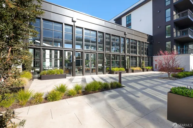 a view of a building with a garden