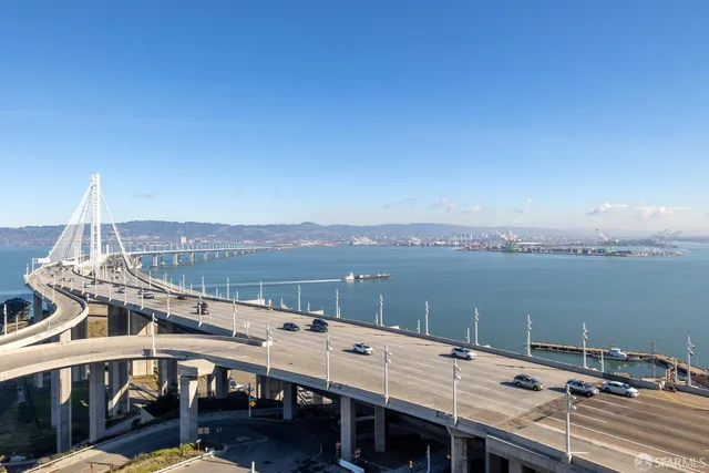 a view of a balcony with two chairs