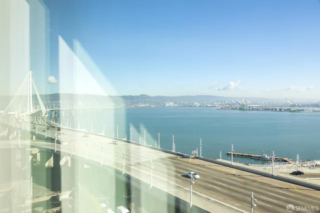 a view of a lake from a balcony