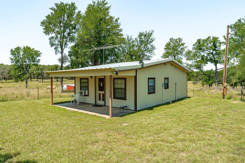 1340 County Road 189 Jonesboro, TX 76538 - Photo 28 of 39 a view of an house with backyard space and garden