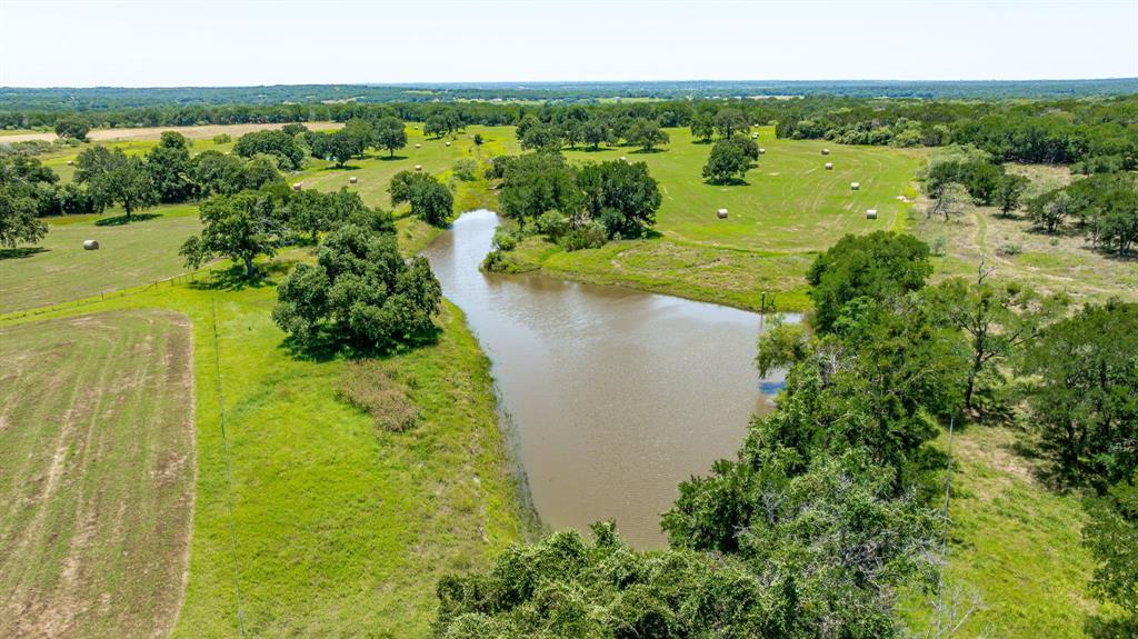 1340 County Road 189 Jonesboro, TX 76538 - Photo 31 of 39 a view of a lake with a yard