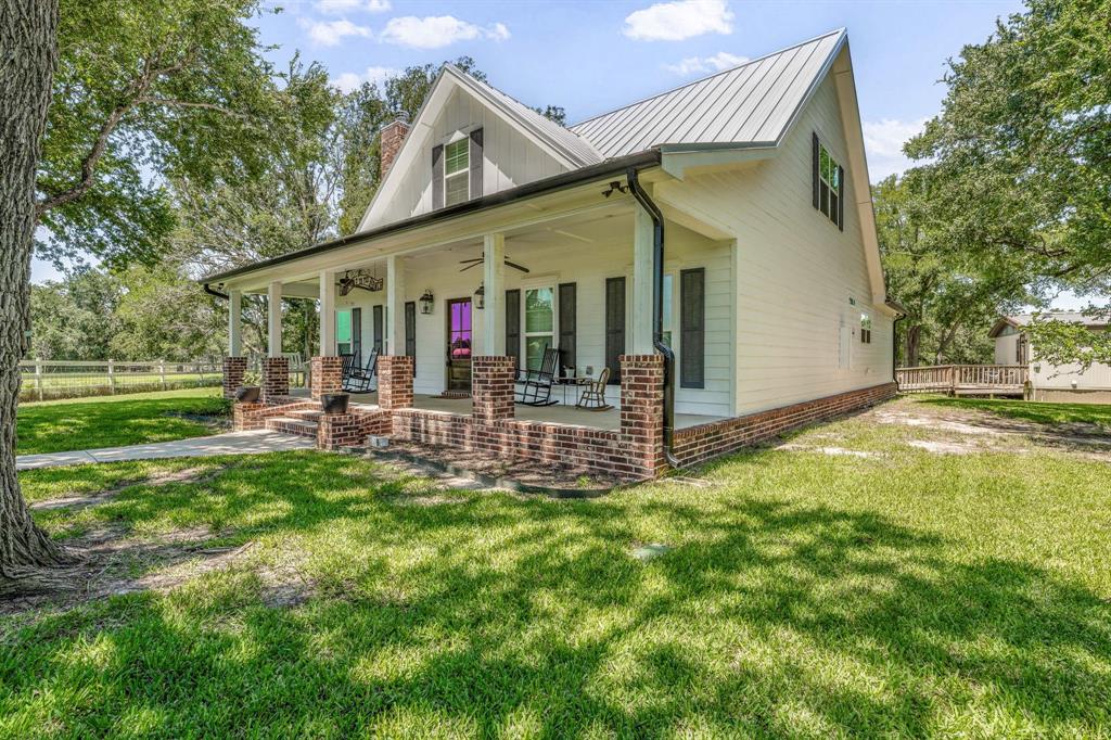 1340 County Road 189 Jonesboro, TX 76538 - Photo 8 of 39 a view of a house with yard and tree s