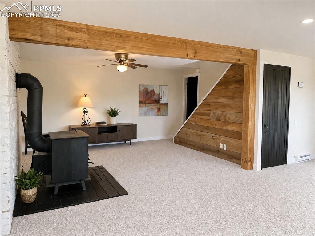 12285 Old Barn Road Elbert, CO 80106 - Photo 23 of 39 a view of a livingroom with furniture and staircase