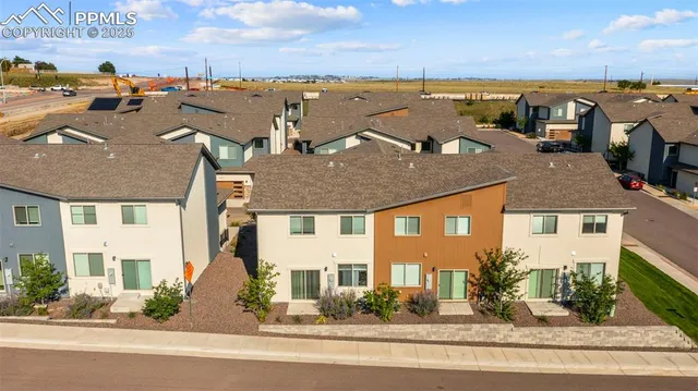 a view of a street with an ocean view