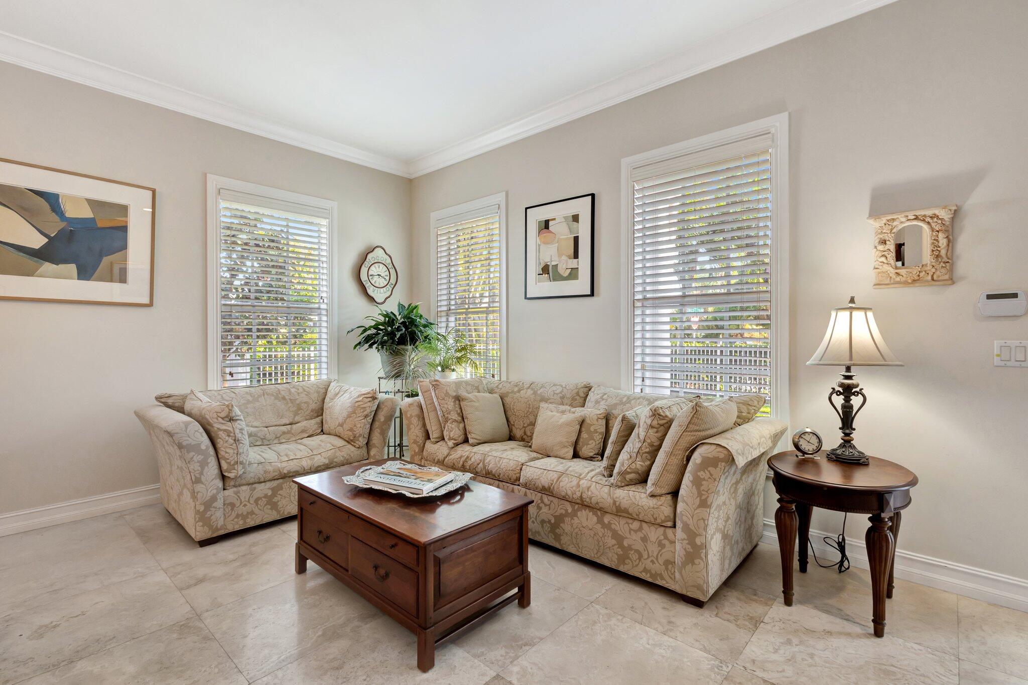 213 Kings Lynn Delray Beach, FL 33444 - Photo 14 of 39 a living room with furniture