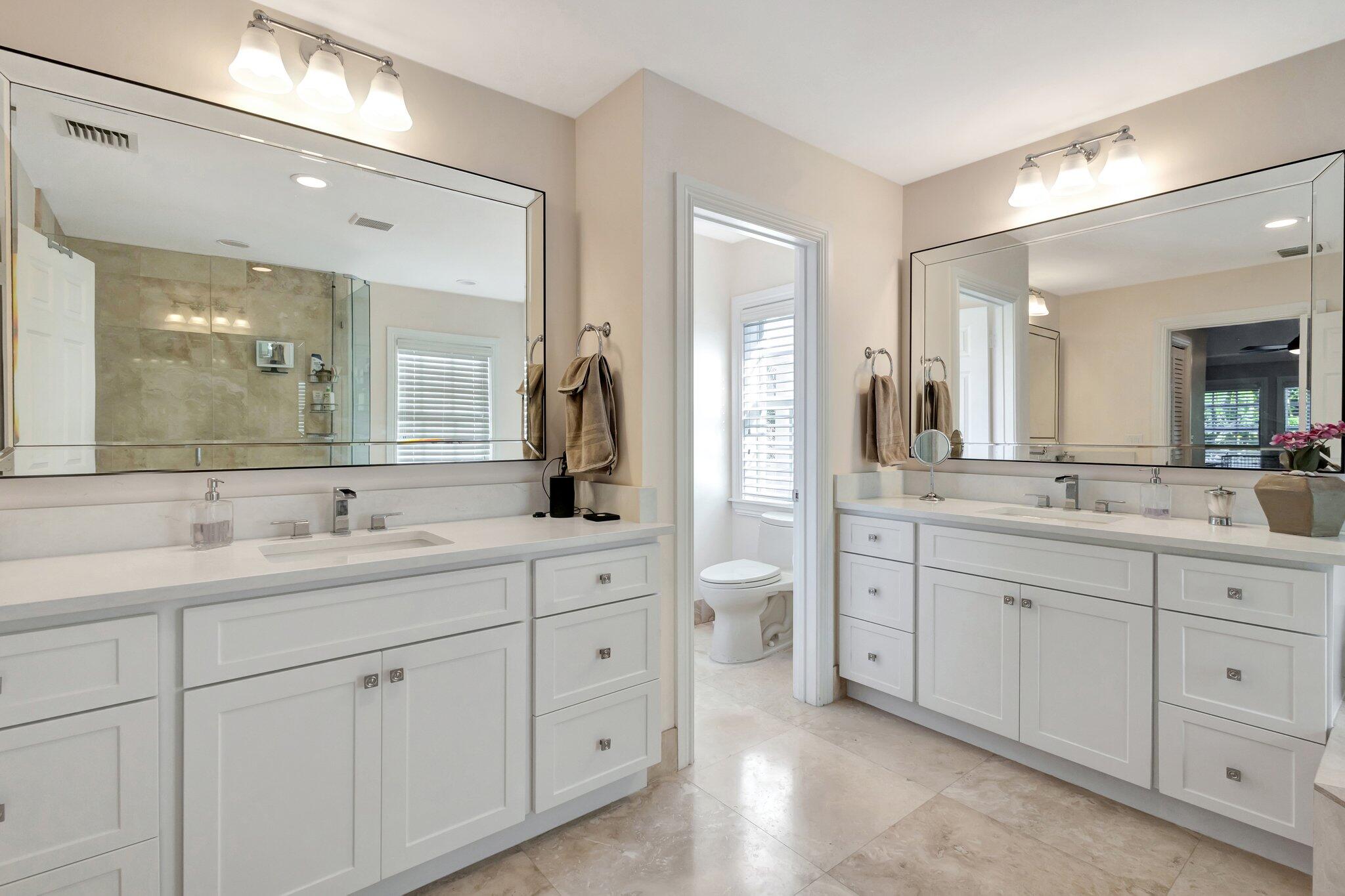 213 Kings Lynn Delray Beach, FL 33444 - Photo 18 of 39 a spacious en suite bathroom with double sink and mirror
