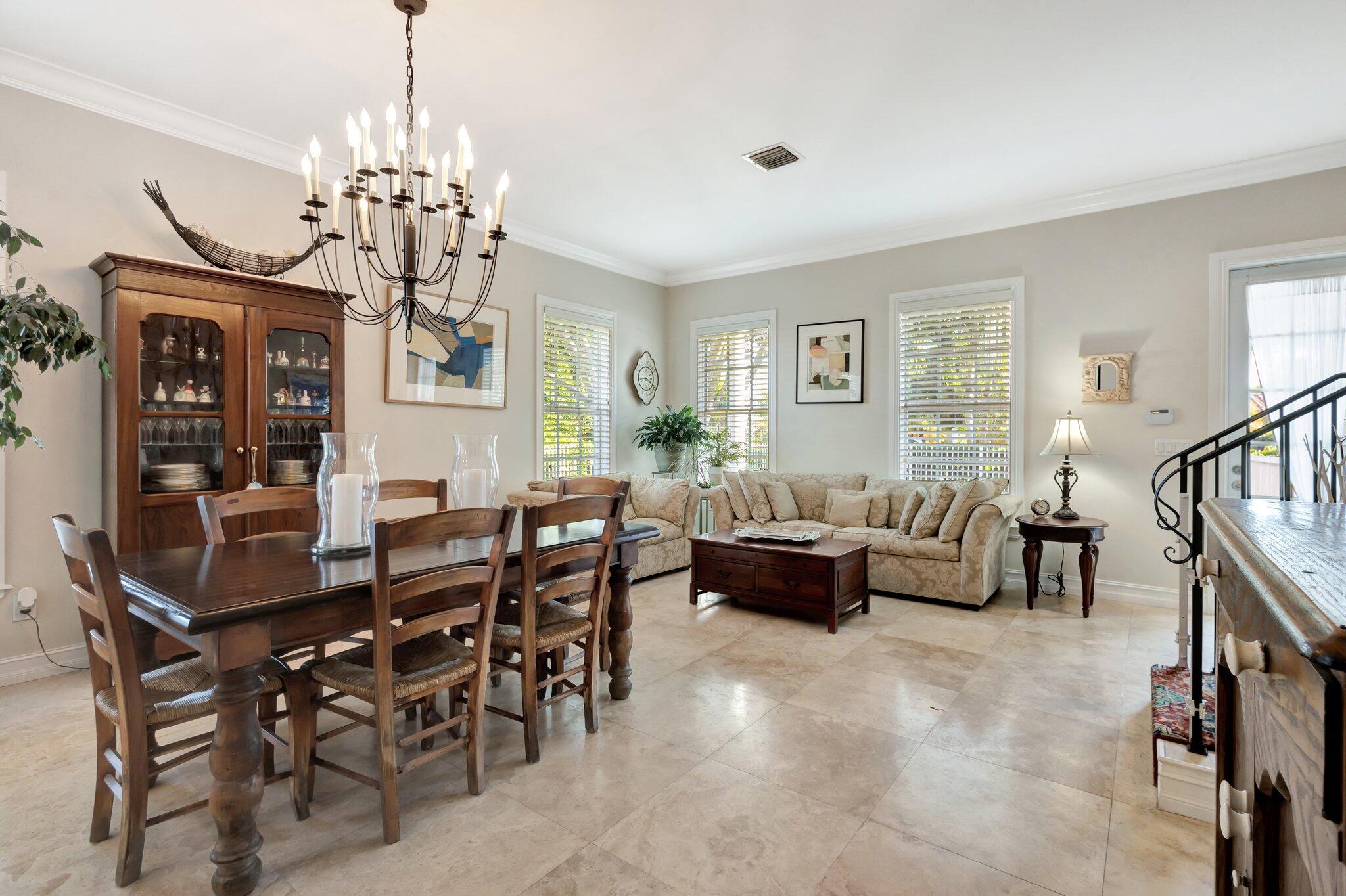 213 Kings Lynn Delray Beach, FL 33444 - Photo 32 of 39 a view of a livingroom and dining room