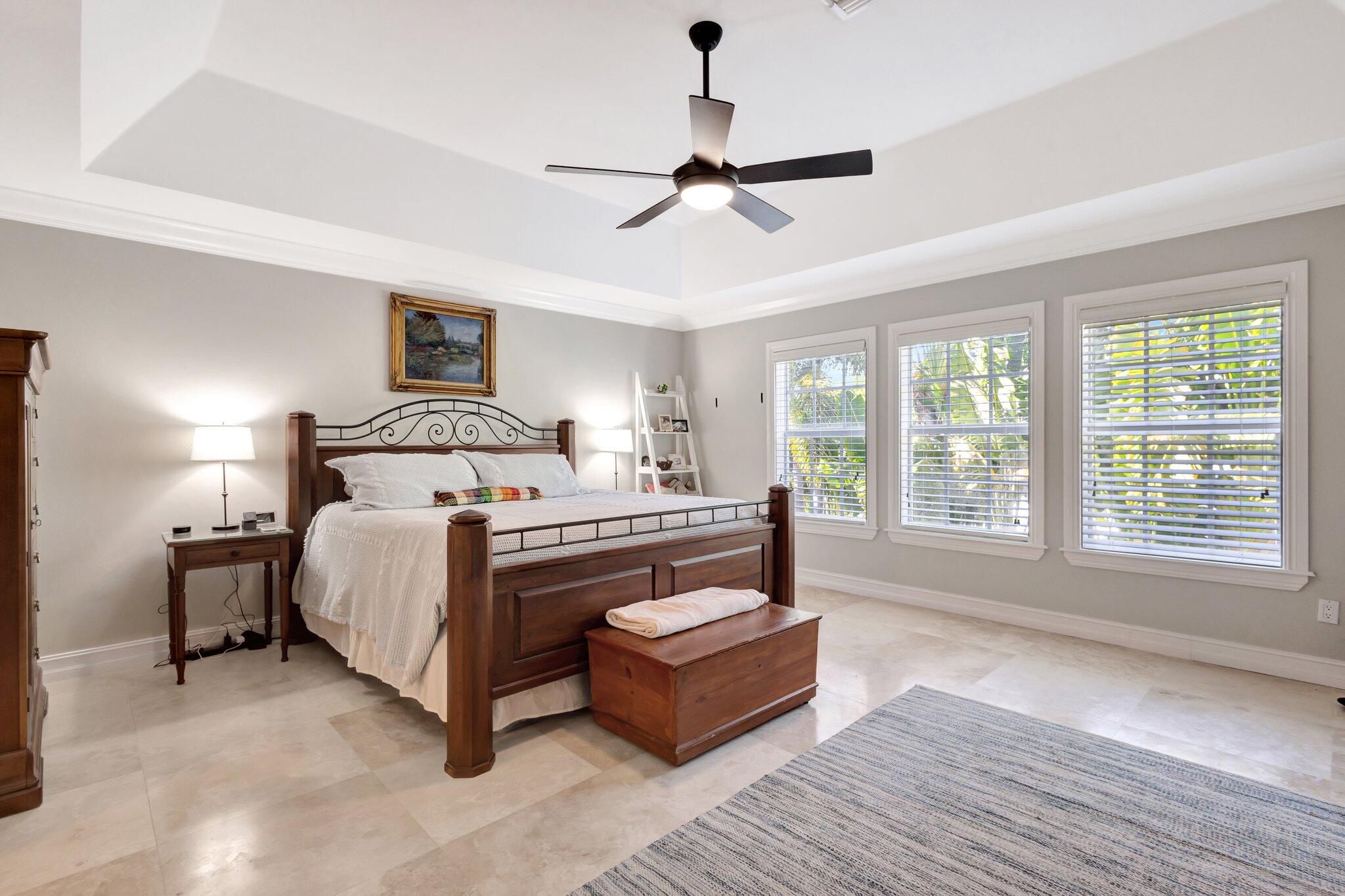 213 Kings Lynn Delray Beach, FL 33444 - Photo 39 of 39 a bedroom with a bed couch and window