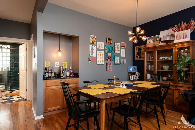 a dining room with furniture and window