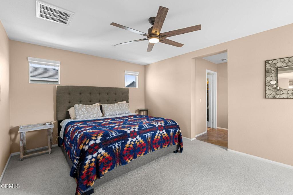 3512 North Oxnard Boulevard Oxnard, CA 93036 - Photo 12 of 41 a bedroom with a bed and window