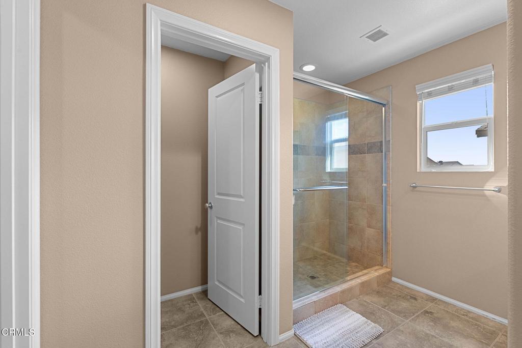 3512 North Oxnard Boulevard Oxnard, CA 93036 - Photo 15 of 41 a bathroom with a glass shower door