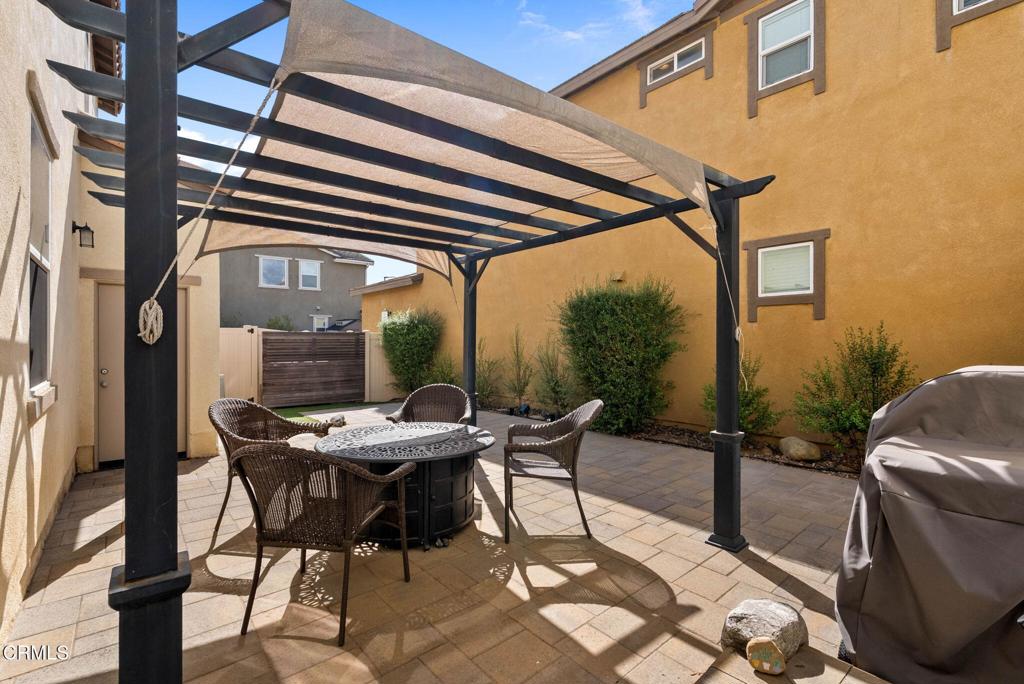 3512 North Oxnard Boulevard Oxnard, CA 93036 - Photo 24 of 41 a patio with table and chairs and potted plants