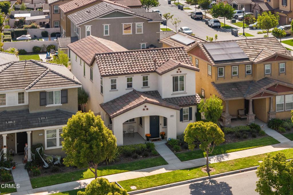3512 North Oxnard Boulevard Oxnard, CA 93036 - Photo 32 of 41 a view of a white house next to a yard