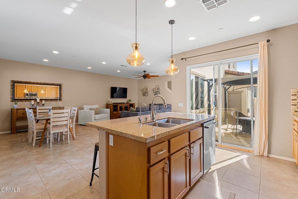 3512 North Oxnard Boulevard Oxnard, CA 93036 - Photo 6 of 41 a kitchen with a table and chairs in it