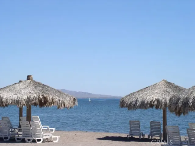 a view of an chairs and tables in patio