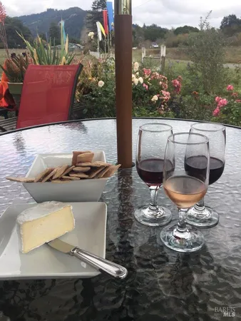a outdoor sitting area with furniture and city view