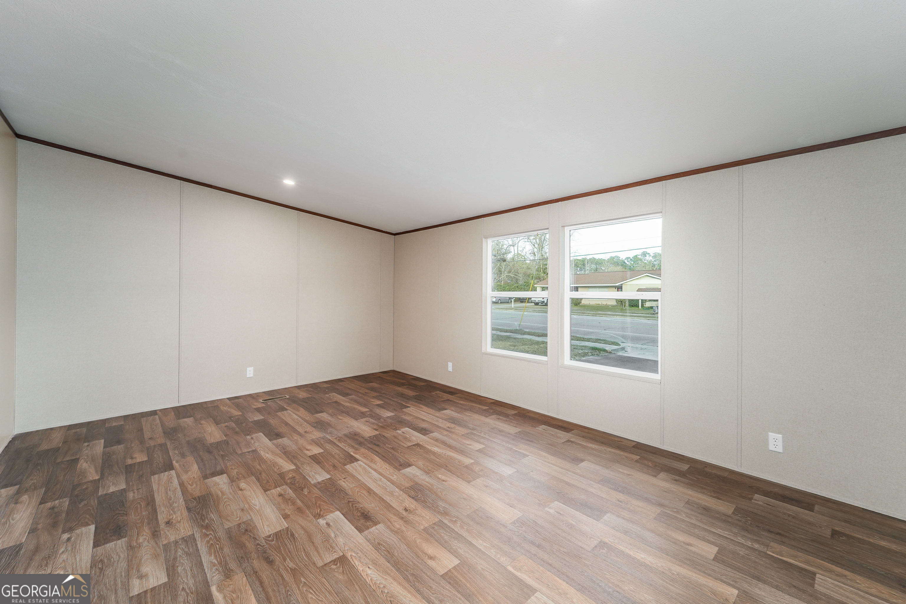 1808 Brunel Street Waycross, GA 31503 - Photo 13 of 26 a view of an empty room with a window