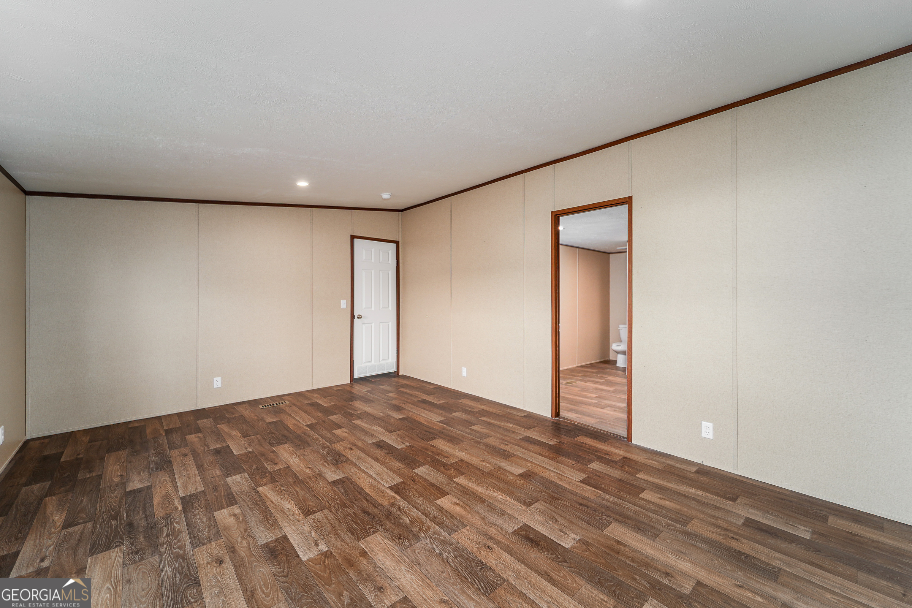 1808 Brunel Street Waycross, GA 31503 - Photo 14 of 26 a view of an empty room and window