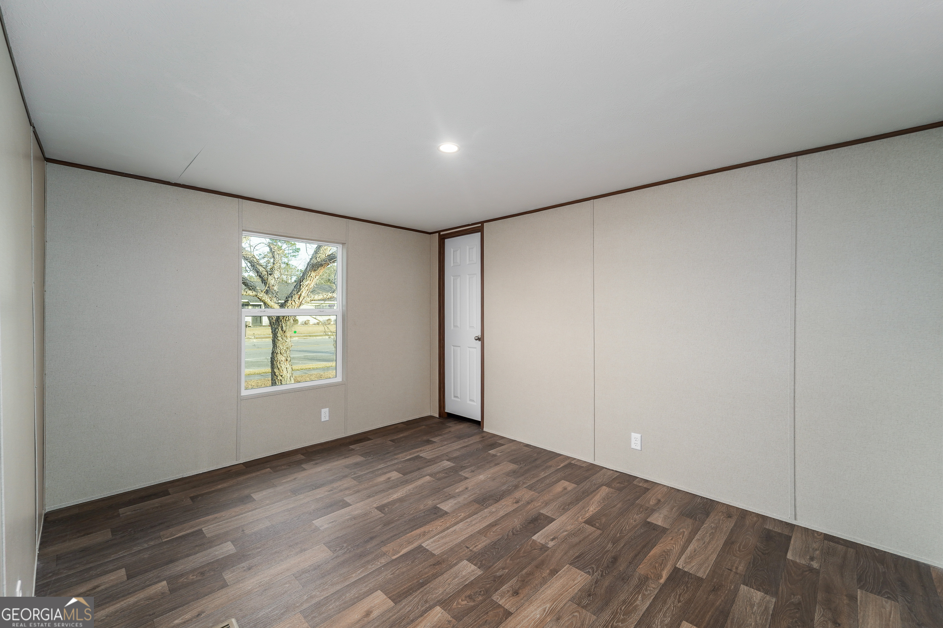 1808 Brunel Street Waycross, GA 31503 - Photo 17 of 26 an empty room with a window