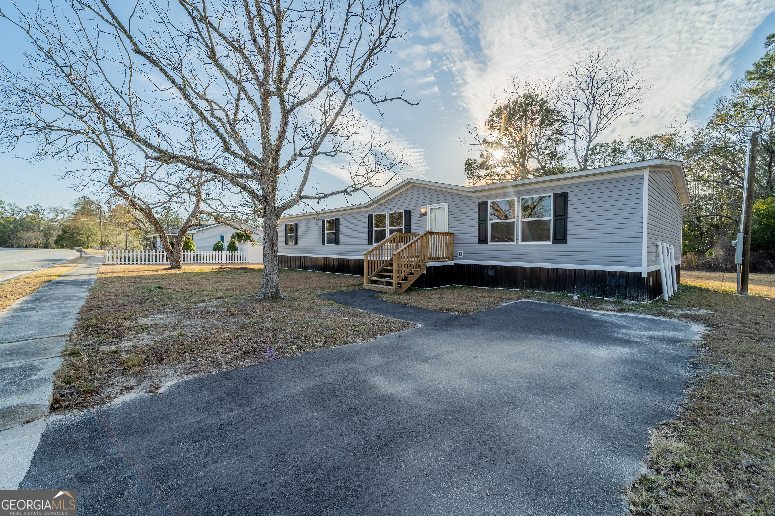 1808 Brunel Street Waycross, GA 31503 - Photo 2 of 26 a house view with a outdoor space