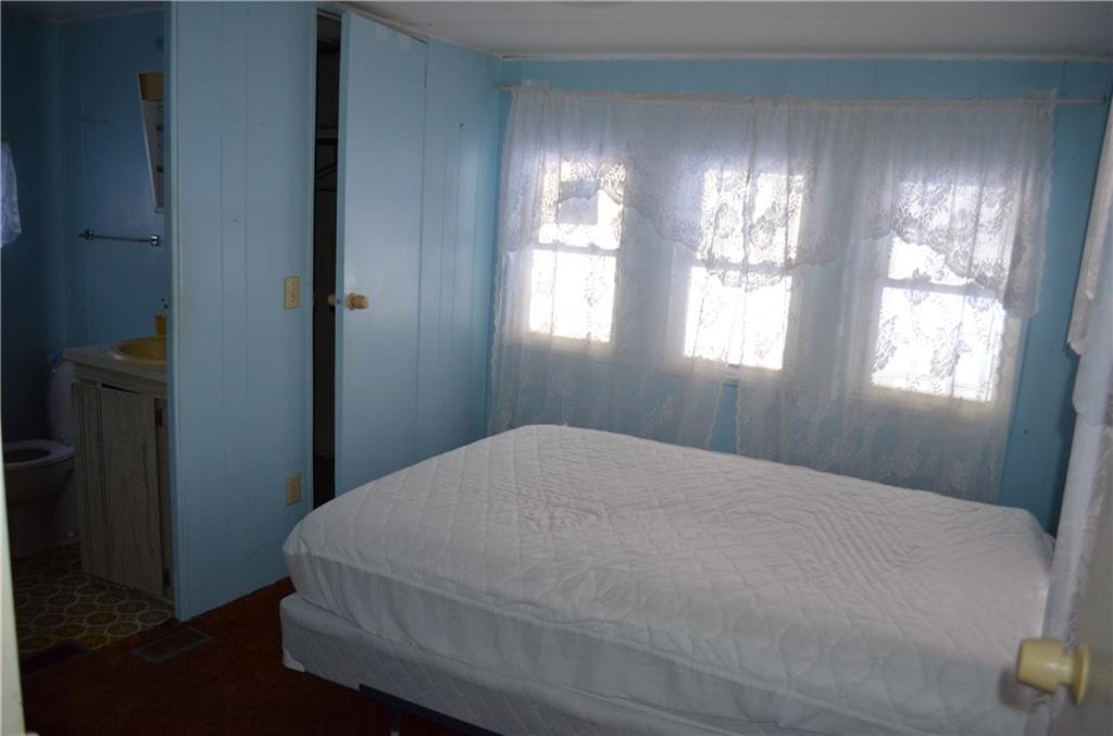 13 Perry Road Parkman, ME 04443 - Photo 5 of 18 Bedroom with full bath