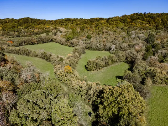 a view of mountains and valleys