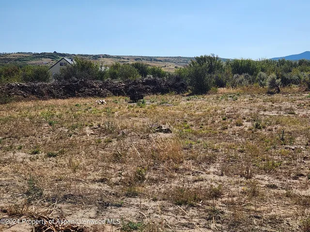 a view of a road with a mountain