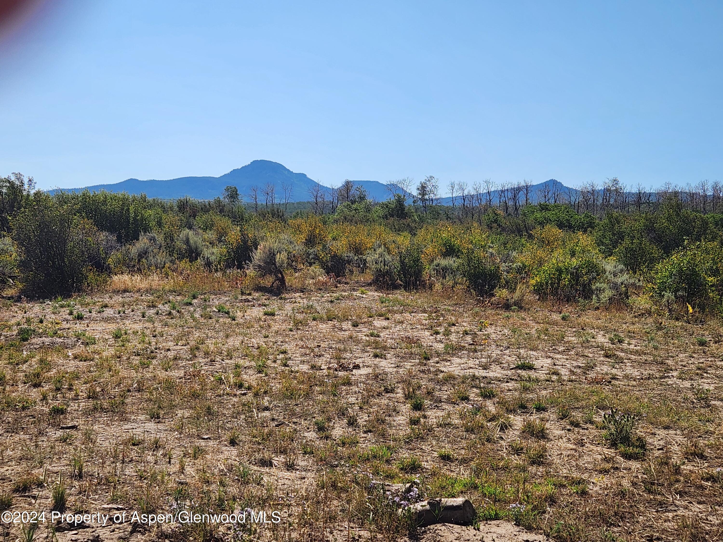 242 Boulder Drive Craig, CO 81625 - Photo 20 of 47 a view of a town with mountains in the background