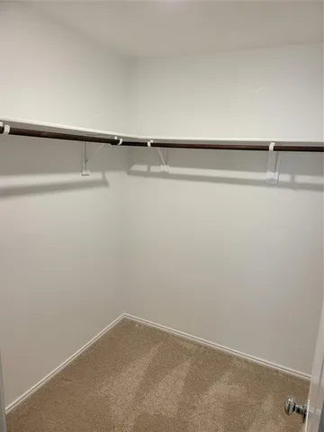 a view of small space with racks on the wall