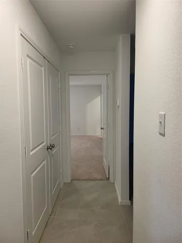 a view of room with hallway