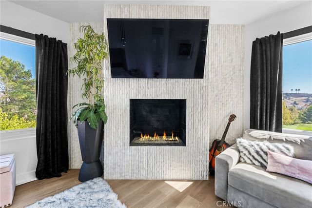 a bathroom with a sink a mirror and a shower