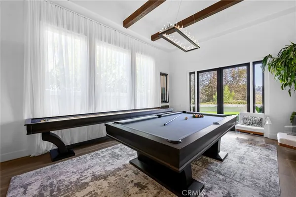 a view of a living room and entry way