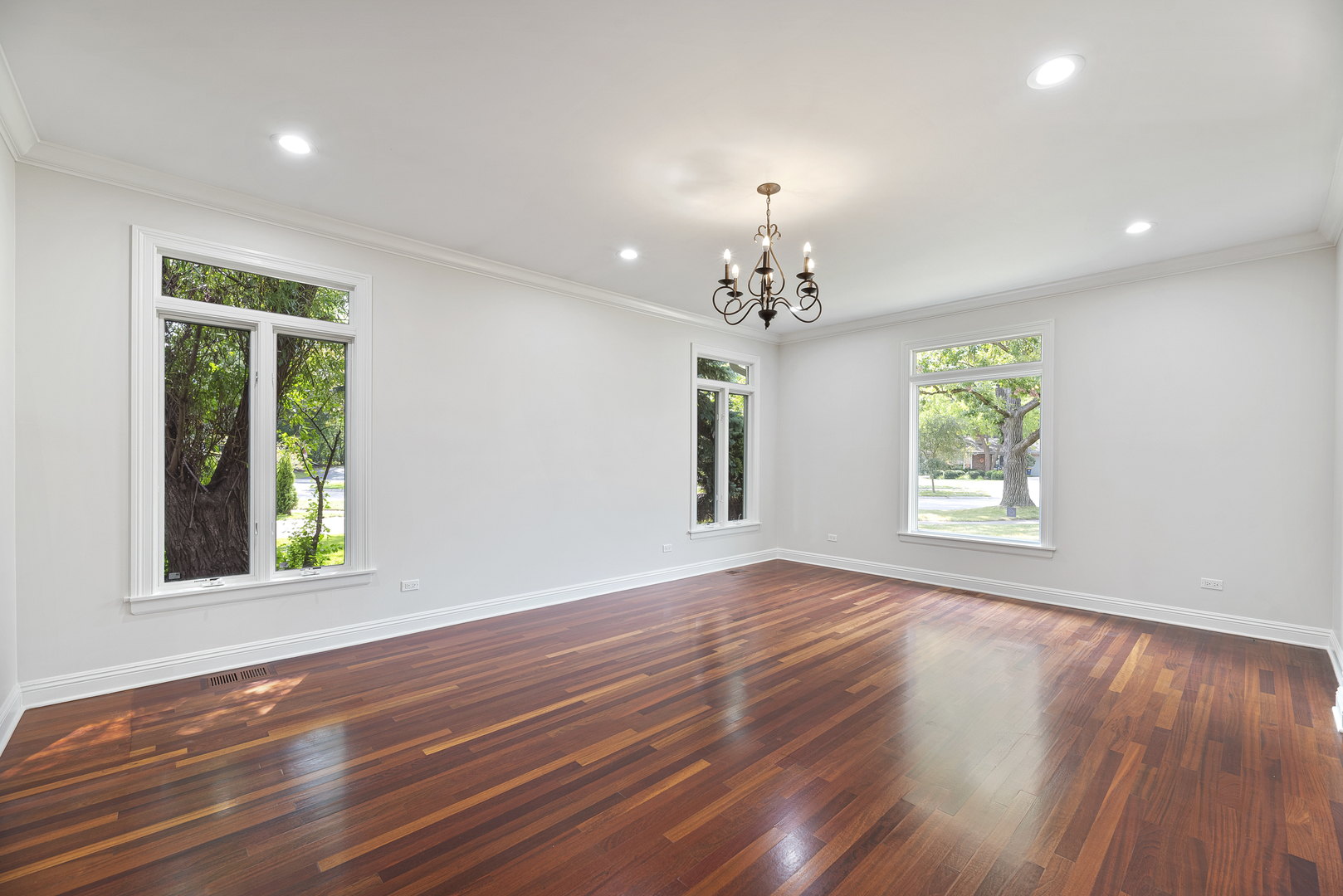 701 Ridge Road Highland Park, IL 60035 - Photo 16 of 60 a view of an empty room with wooden floor and a window
