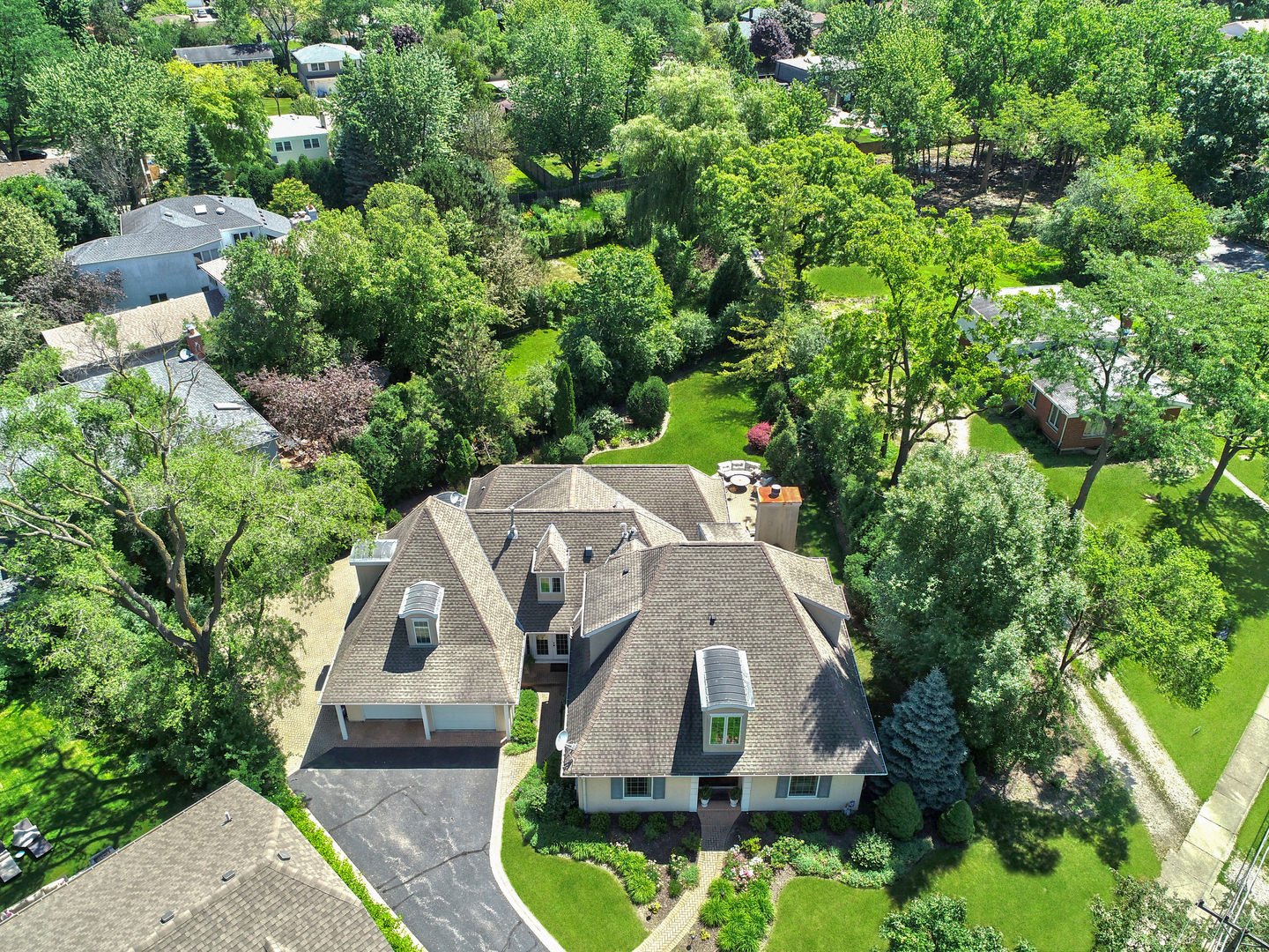 701 Ridge Road Highland Park, IL 60035 - Photo 2 of 60 an aerial view of a house with swimming pool and garden