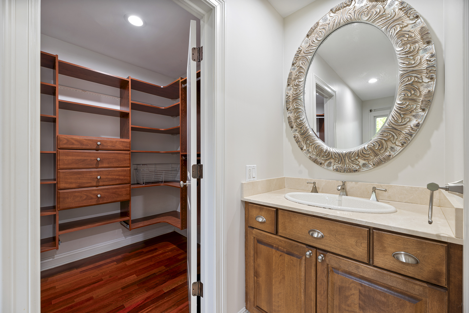 701 Ridge Road Highland Park, IL 60035 - Photo 26 of 60 a bathroom with a sink and a mirror