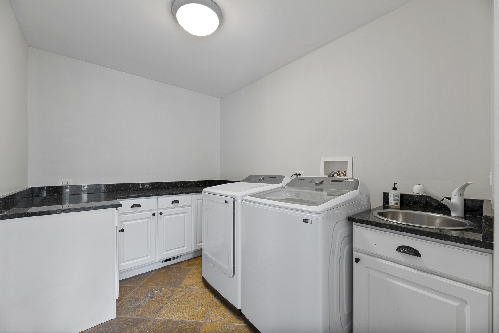 701 Ridge Road Highland Park, IL 60035 - Photo 29 of 60 a utility room with dryer and washer