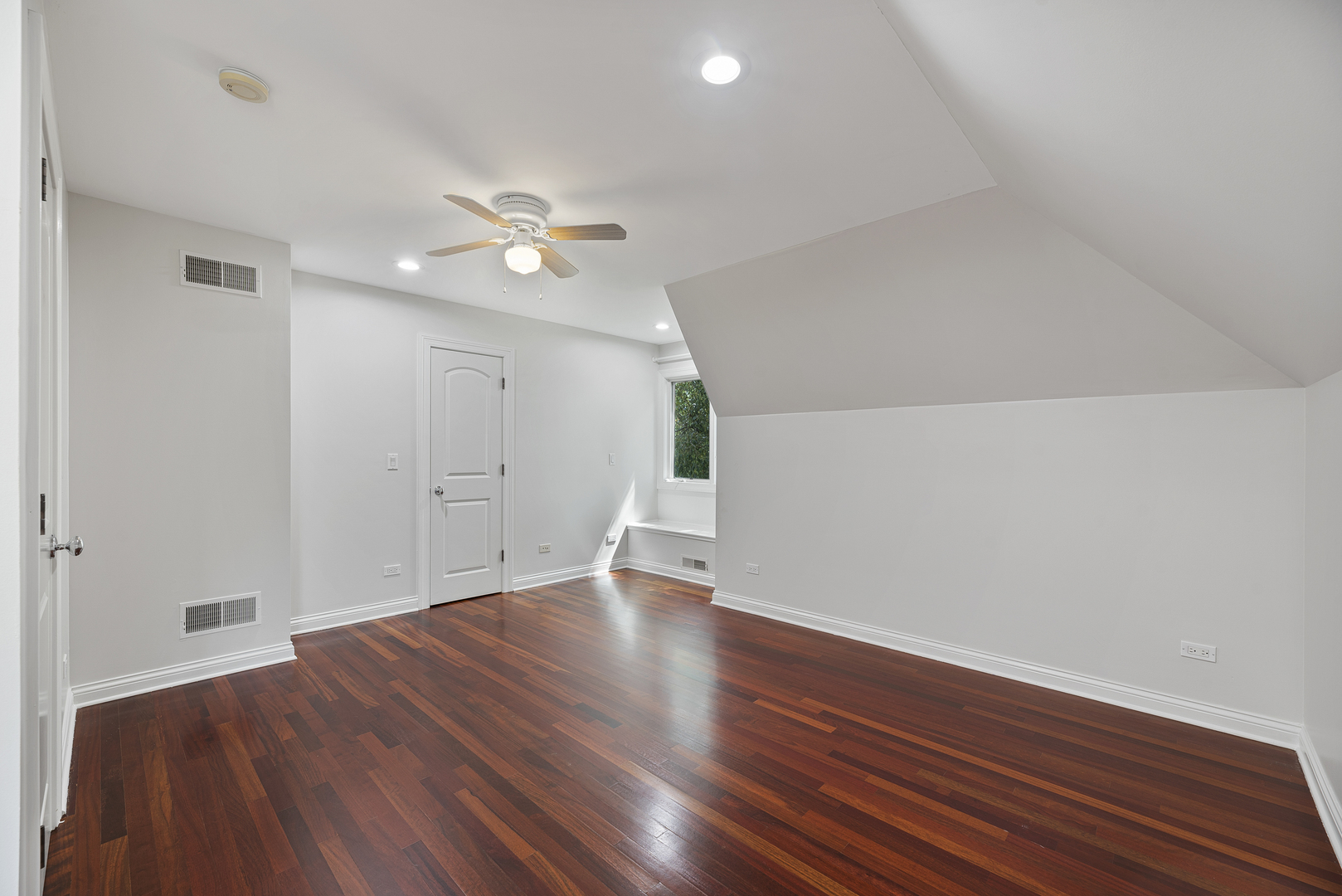 701 Ridge Road Highland Park, IL 60035 - Photo 36 of 60 wooden floor in an empty room with a window