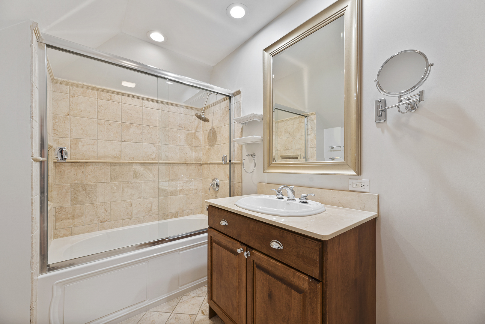 701 Ridge Road Highland Park, IL 60035 - Photo 37 of 60 a bathroom with a sink and a mirror