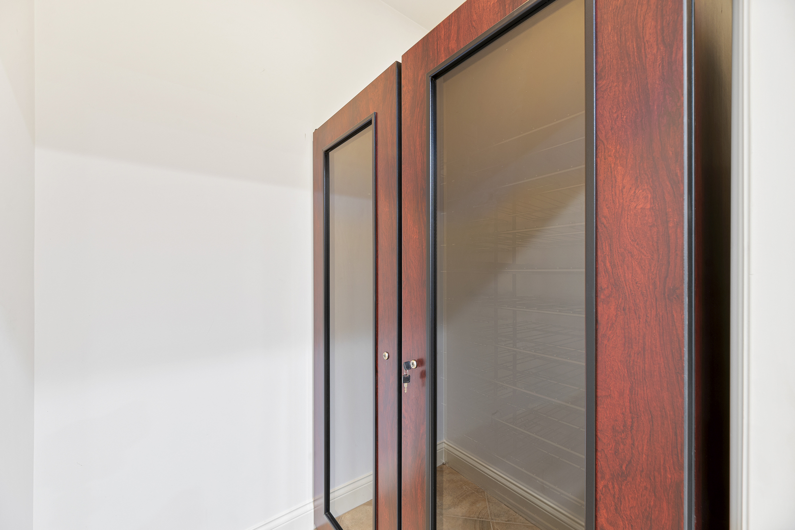 701 Ridge Road Highland Park, IL 60035 - Photo 44 of 60 a bathroom with a shower and a mirror