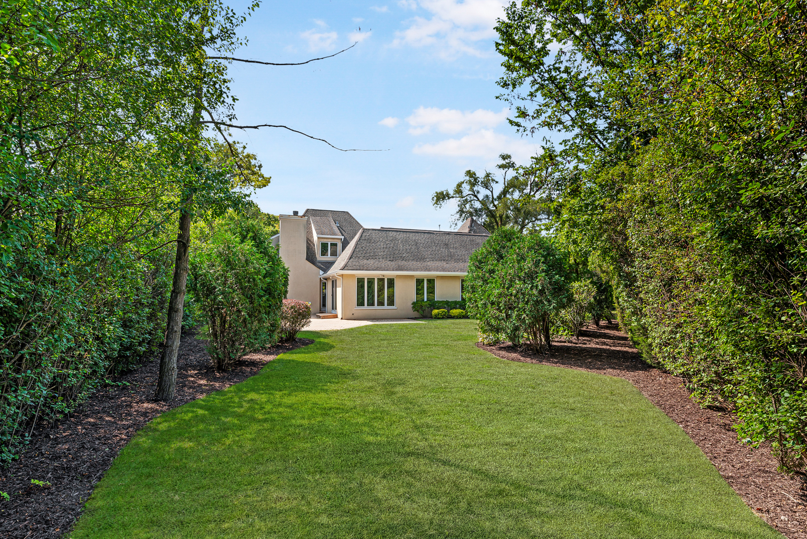 701 Ridge Road Highland Park, IL 60035 - Photo 54 of 60 a view of house in front of a big yard with large trees