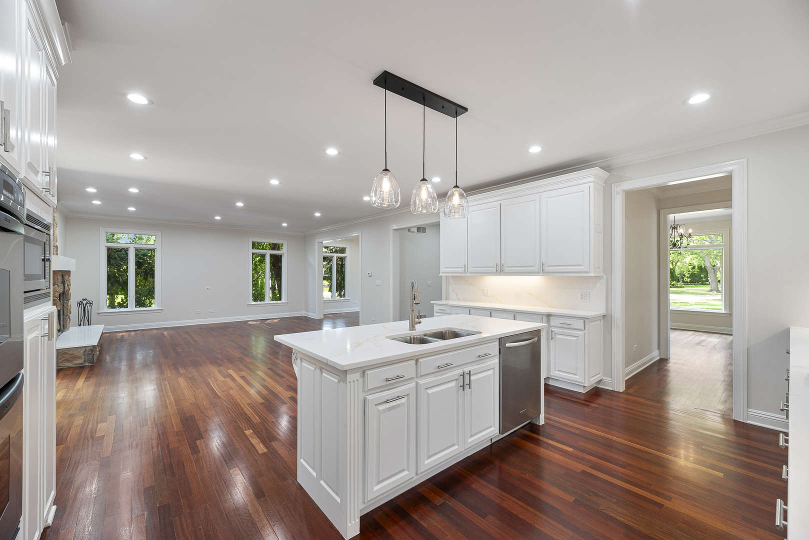 701 Ridge Road Highland Park, IL 60035 - Photo 10 of 60 a kitchen with a sink and wooden floor