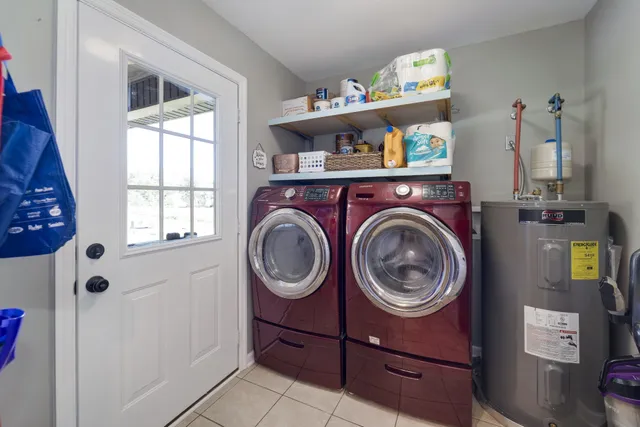 a view of storage and utility room with washer and dryer