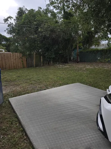 a view of a backyard with green space